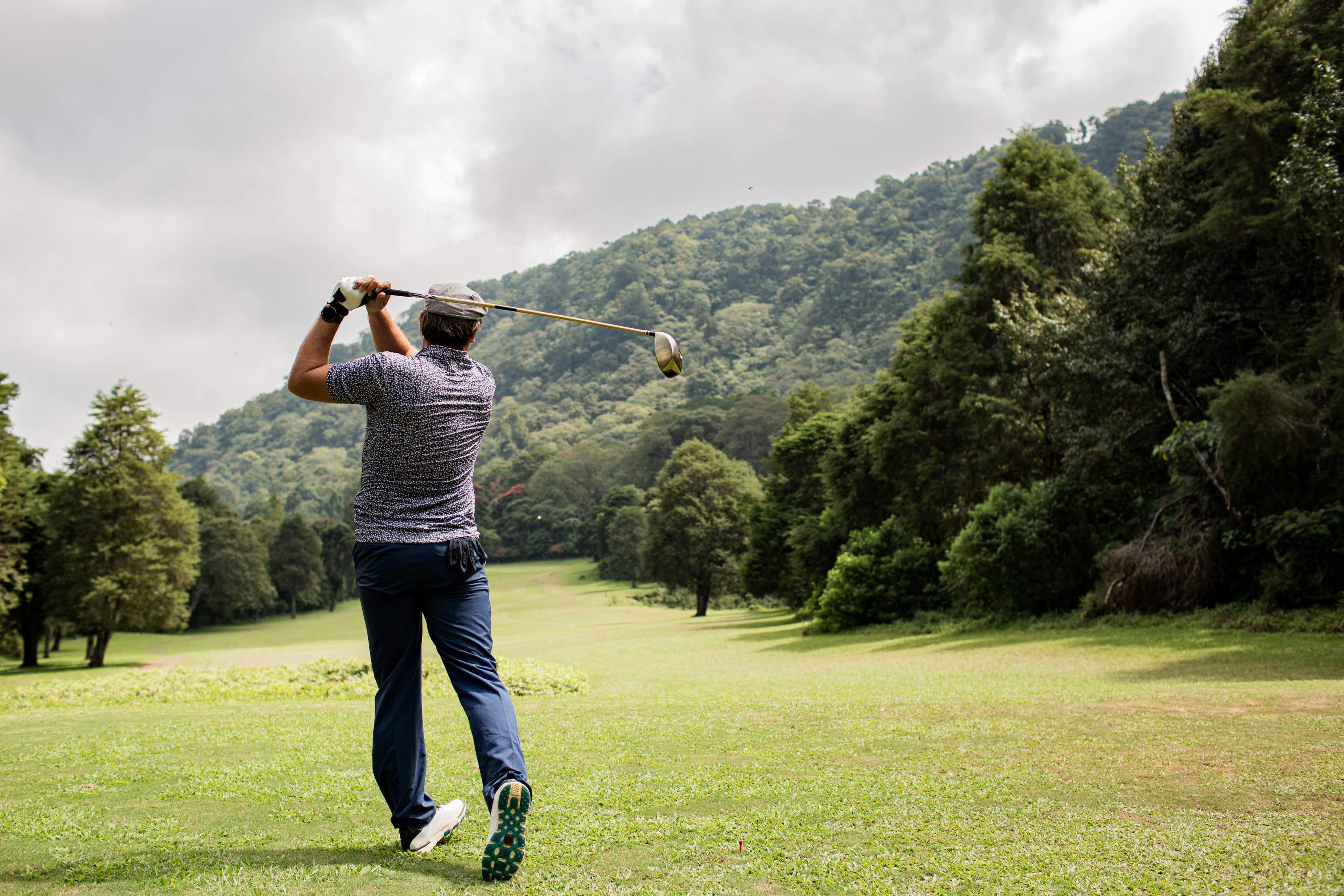 Hero background showing a golfer on the course